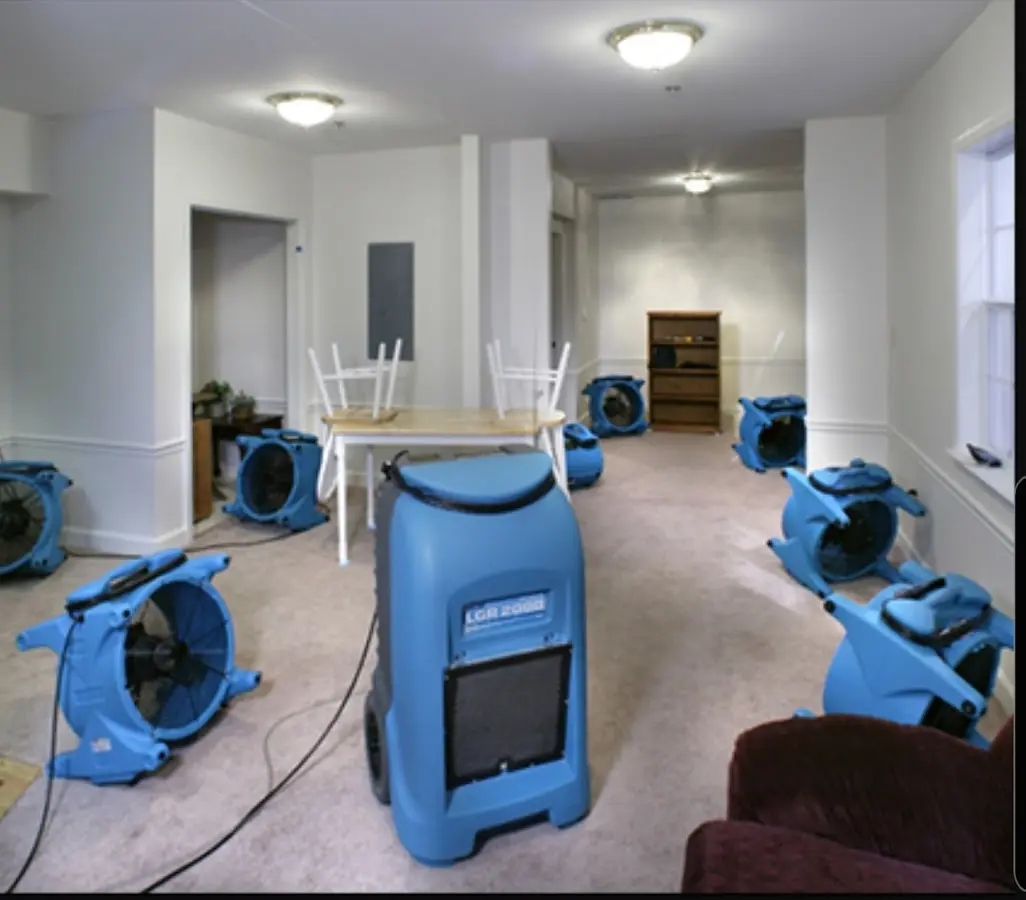 Air movers and dehumidifier setup for Water Damage Restoration in Forest Park